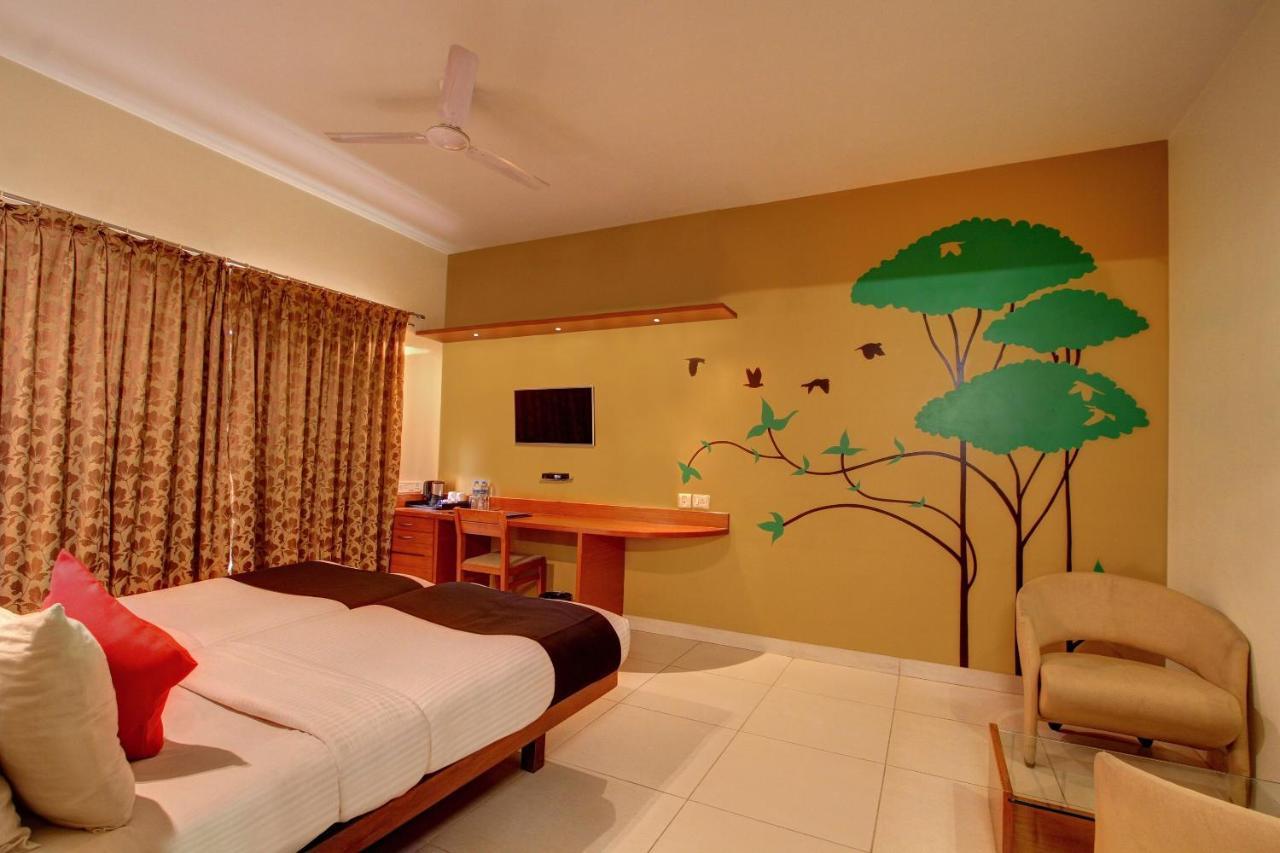 Capital O 16165 Cartier Hotel Bangalore Phòng bức ảnh