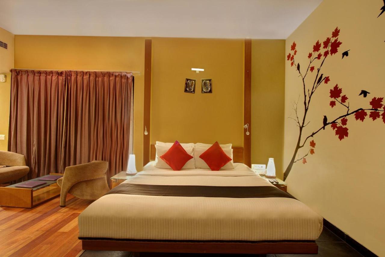Capital O 16165 Cartier Hotel Bangalore Phòng bức ảnh